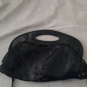 Sequined black clutch